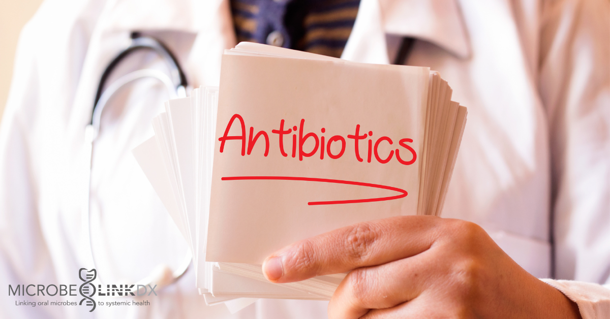 When Should You Start Systemic Antibiotics? Paper points and systemic antibiotics illustrating the timing of adjunctive antibiotic therapy during periodontal treatment.